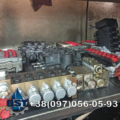 Ремонт гідророзподільника автогрейдера HBM
